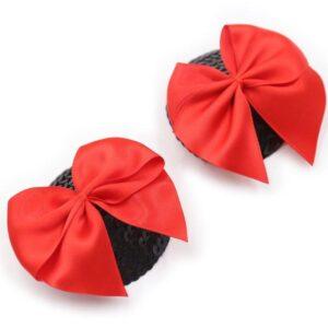 Paire de cache tétons adhésifs noir avec nœud papillon rouge