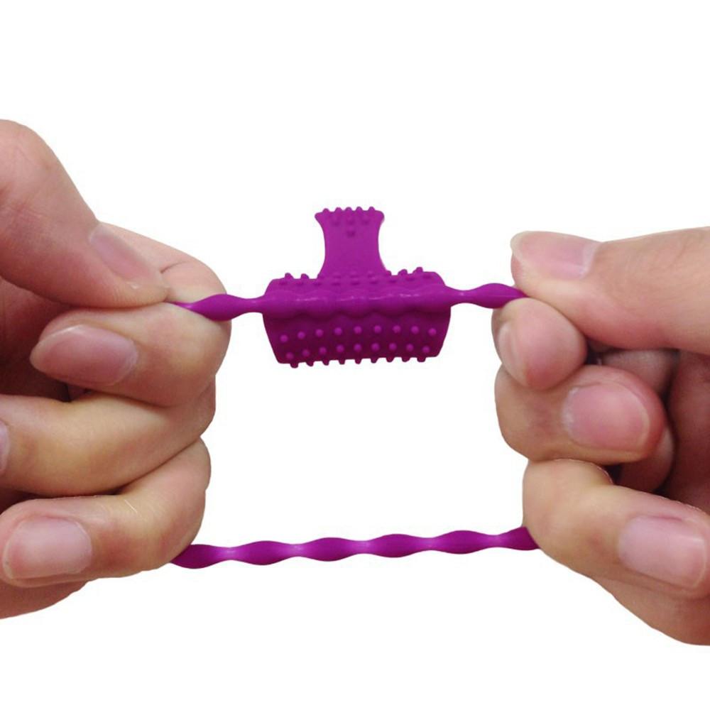 Anneau violet vibrant silicone avec langue picot Pocket Pleasure 1 dosette de lubrifiant